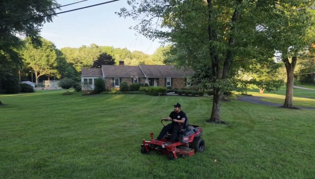 Our crew mowing a large lawn in Chester County, PA