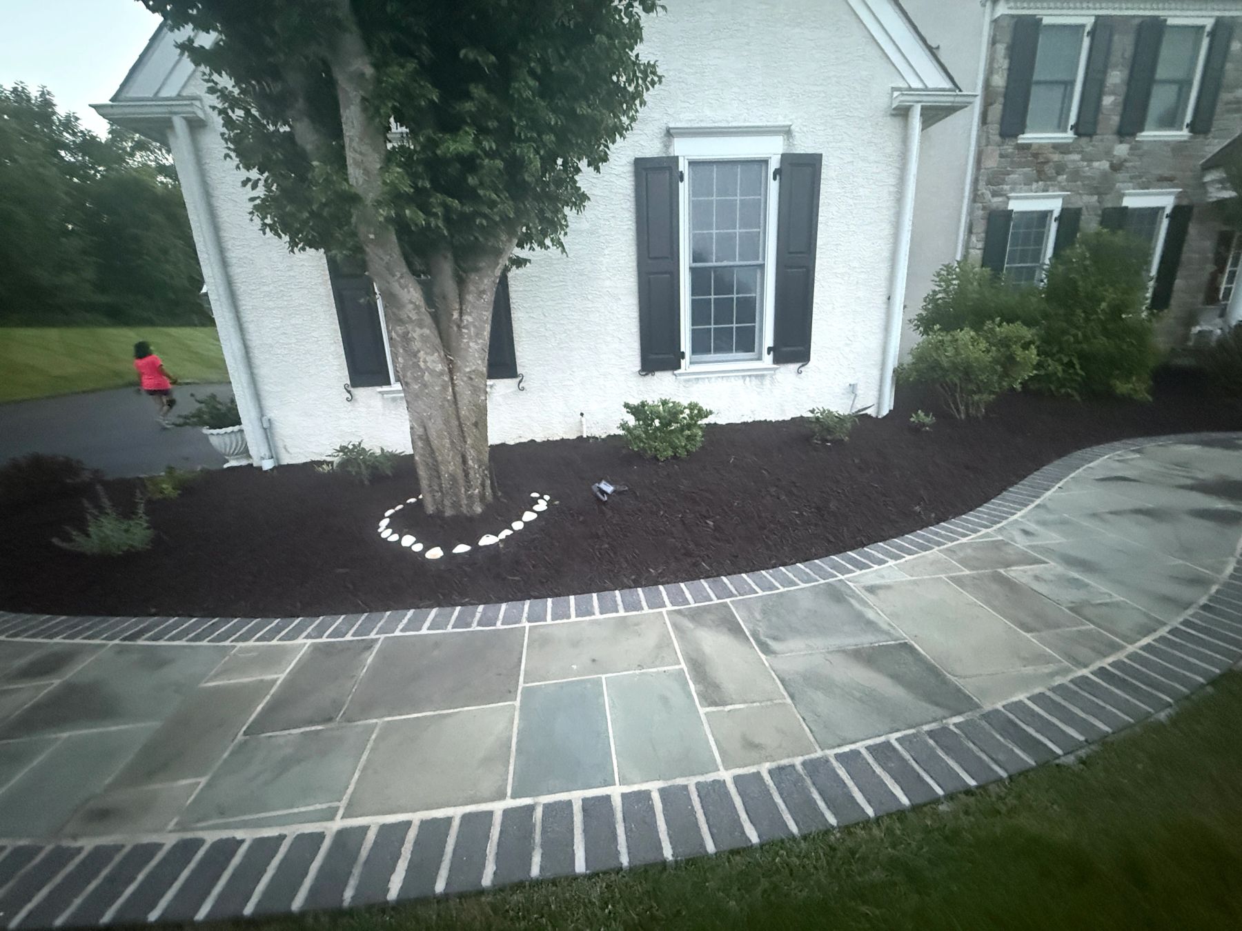 Flagstone patio and walkway with mulch border